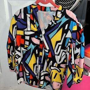 Never been worn. Colorful, abstract, 3/4 sleeve blouse.
